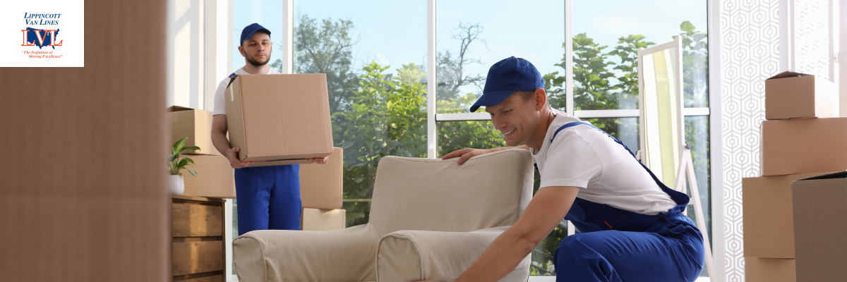 2 men moving furniture